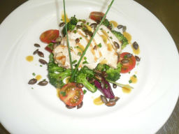 Chicken, broccoli, pumpkin seed and tomato salad